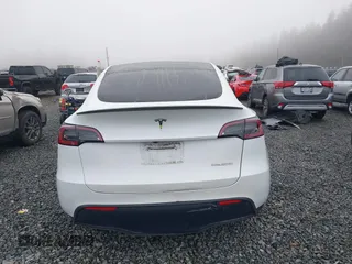 2023 Tesla Model Y Performance z VIN 7SAYGDEF2PF917295, wystawiony jako IAAI lot #41260852 z przebiegiem 23 295 mil mil oraz . Historia ofert i sprzedaży dostępna na DreamBid. Obrazek 16.