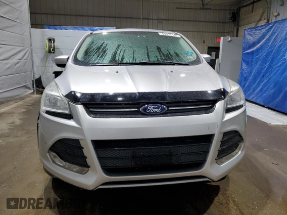 2014 Ford Escape SE with VIN 1FMCU9GX1EUC26584, listed as a Copart auction lot 49311145 with 130,545 mi miles and Salvage Title. Bid and sale history available at carsss.com. Image 5.