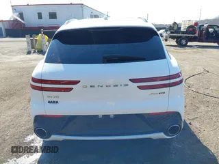 2022 Genesis GV70 Sport z VIN KMUMCDTC4NU039497, wystawiony jako IAAI lot #41668778 z przebiegiem 31 545 mil mil oraz . Historia ofert i sprzedaży dostępna na DreamBid. Obrazek 16.
