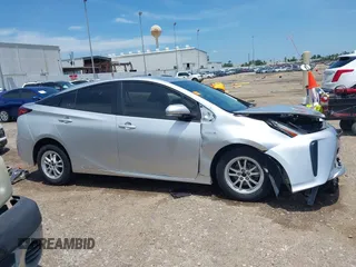 2022 Toyota Prius L Eco with VIN JTDKAMFU4N3170522, listed as a IAAI auction lot 42351817 with 90,561 mi miles and . Bid and sale history available at DreamBid. Image 13.