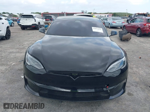 2023 Tesla Model S with VIN 5YJSA1E53PF510757, listed as a IAAI auction lot 42075624 with Not provided miles and . Bid and sale history available at DreamBid. Image 13.