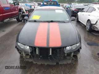 2004 Pontiac GTO z VIN 6G2VX12G84L183838, wystawiony jako IAAI lot #41946144 z przebiegiem 134 718 mil mil oraz . Historia ofert i sprzedaży dostępna na DreamBid. Obrazek 12.