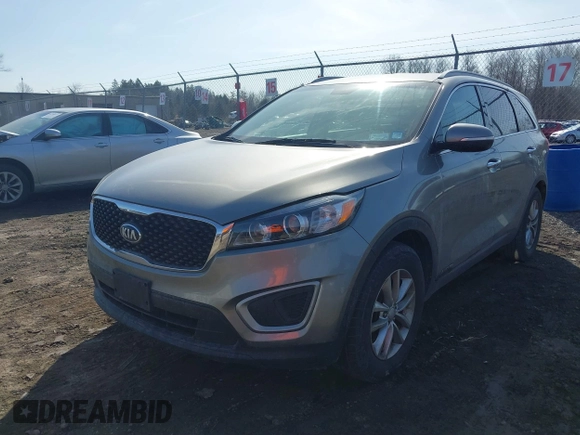 2016 Kia Sorento LX with VIN 5XYPGDA54GG065563, listed as a IAAI auction lot 41801533 with 126,557 mi miles. Bid and sale history available at carsss.com. Image 2.