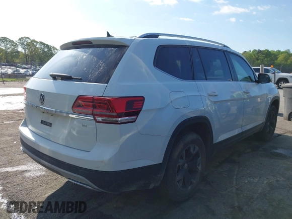 2018 Volkswagen Atlas SE with VIN 1V2CR2CAXJC548220, listed as a IAAI auction lot 41983957 with 118,371 mi miles and . Bid and sale history available at DreamBid. Image 4.