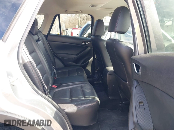 2014 Mazda CX-5 Grand Touring with VIN JM3KE2DY8E0375025, listed as a IAAI auction lot 41657755 with 103,601 mi miles. Bid and sale history available at carsss.com. Image 8.
