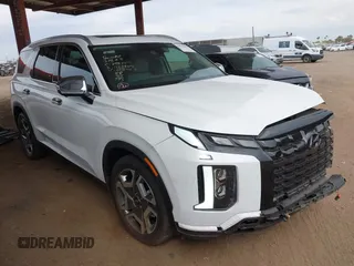 2023 Hyundai Palisade SEL z VIN KM8R44GEXPU625427, wystawiony jako IAAI lot #41922493 z przebiegiem 11 793 mil mil oraz . Historia ofert i sprzedaży dostępna na DreamBid. Obrazek 1.