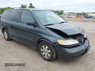 2003 Honda Odyssey EX-L z VIN 5FNRL18053B133092, wystawiony jako IAAI lot #42365081 z przebiegiem 239 753 mil mil oraz . Historia ofert i sprzedaży dostępna na DreamBid. Obrazek 1.