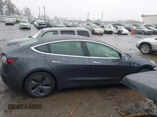 2020 Tesla Model 3 Long Range z VIN 5YJ3E1EBXLF770064, wystawiony jako IAAI lot #41424909 z przebiegiem 96 972 mil mil oraz . Historia ofert i sprzedaży dostępna na DreamBid. Obrazek 14.