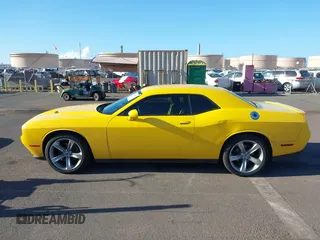 2017 Dodge Challenger SXT z VIN 2C3CDZAG3HH501610, wystawiony jako IAAI lot #42163027 z przebiegiem 66 464 mil mil oraz . Historia ofert i sprzedaży dostępna na DreamBid. Obrazek 14.