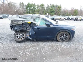 2018 Mazda CX-5 Grand Touring with VIN JM3KFBDM5J0313103, listed as a IAAI auction lot 35896676 with 43,918 mi miles. Bid and sale history available at carsss.com. Image 12.
