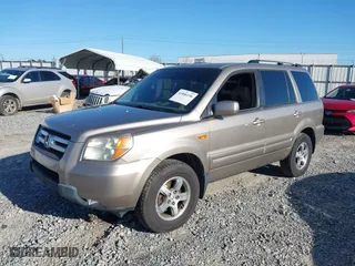 2007 Honda Pilot EX-L with VIN 5FNYF28537B024558, listed as a IAAI auction lot 41806196 with 196,256 mi miles. Bid and sale history available at carsss.com. Image 2.