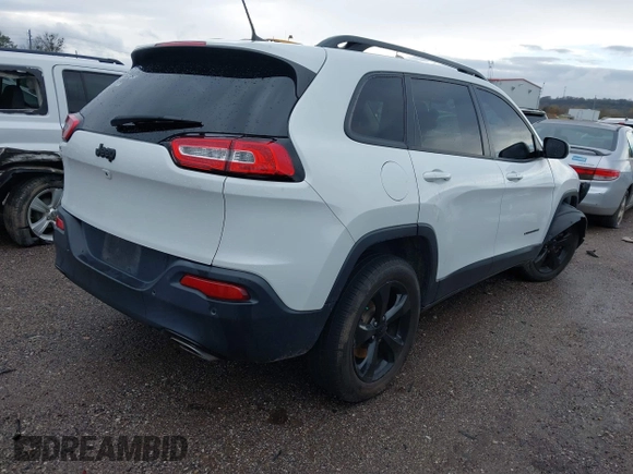 2016 Jeep Cherokee Latitude with VIN 1C4PJMCSXGW214243, listed as a IAAI auction lot 40850362 with 96,240 mi miles and . Bid and sale history available at carsss.com. Image 4.