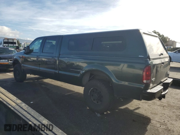 2001 Ford Super Duty F-250 XL with VIN 1FTNW21S21EB56495, listed as a Copart auction lot 85972944 with 142,122 mi miles and Salvage Title. Bid and sale history available at carsss.com. Image 2.