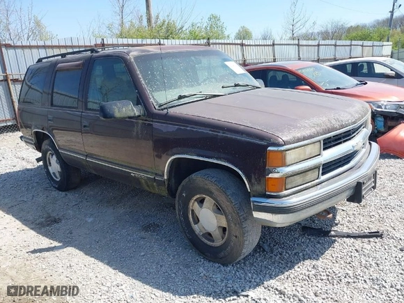 1997 Chevrolet Tahoe with VIN 1GNEK13R5VJ386701, listed as a IAAI auction lot 42046195 with 241,735 mi miles. Bid and sale history available at carsss.com. Image 1.