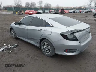 2018 Honda Civic LX with VIN 2HGFC2F56JH585343, listed as a IAAI auction lot 41558691 with 123,838 mi miles. Bid and sale history available at carsss.com. Image 3.