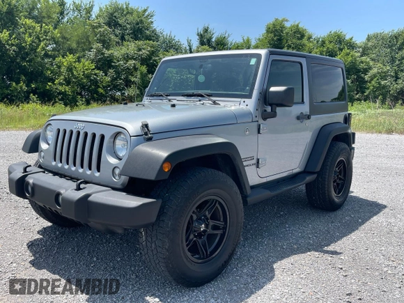 2014 Jeep Wrangler Sport with VIN 1C4AJWAG8EL147947, listed as a Copart auction lot 65750955 with 122,841 mi miles and Clean title. Bid and sale history available at DreamBid. Image 2.