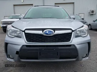 2014 Subaru Forester XT Touring with VIN JF2SJGMC1EH552474, listed as a IAAI auction lot 42461663 with 121,482 mi miles and . Bid and sale history available at DreamBid. Image 12.