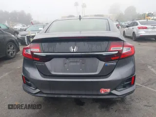 2018 Honda Clarity z VIN JHMZC5F15JC009223, wystawiony jako IAAI lot #41626369 z przebiegiem 46 014 mil mil oraz . Historia ofert i sprzedaży dostępna na DreamBid. Obrazek 16.