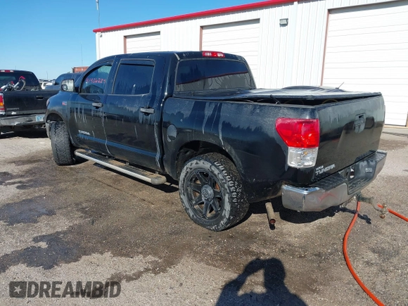 2011 Toyota Tundra z VIN 5TFEY5F12BX115107, wystawiony jako IAAI lot #41426224 z przebiegiem 143 487 mil mil oraz . Historia ofert i sprzedaży dostępna na DreamBid. Obrazek 3.