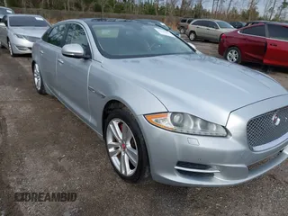 2014 Jaguar XJ with VIN SAJWA2GZ2E8V74309, listed as a IAAI auction lot 40814441 with 1 mi miles. Bid and sale history available at carsss.com. Image 1.