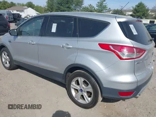 2015 Ford Escape SE with VIN 1FMCU9GX9FUC19545, listed as a IAAI auction lot 42128800 with 157,506 mi miles. Bid and sale history available at carsss.com. Image 3.