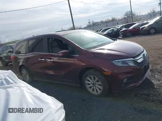 2018 Honda Odyssey EX-L with VIN 5FNRL6H73JB028770, listed as a IAAI auction lot 41984094 with 96,819 mi miles and . Bid and sale history available at DreamBid. Image 12.