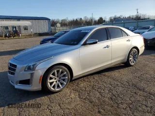 2014 Cadillac CTS Luxury AWD with VIN 1G6AX5S33E0197714, listed as a Copart auction lot 52496745 with 102,618 mi miles and Salvage Title. Bid and sale history available at DreamBid. Image 1.