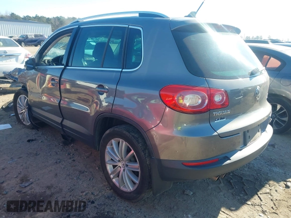 2011 Volkswagen Tiguan SE with VIN WVGBV7AX7BW538690, listed as a IAAI auction lot 41338881 with Not Provided miles and . Bid and sale history available at DreamBid. Image 3.