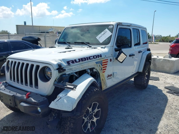 2021 Jeep Wrangler Unlimited Rubicon with VIN 1C4HJXFN9MW519496, listed as a IAAI auction lot 41676845 with 72,767 mi miles. Bid and sale history available at carsss.com. Image 17.