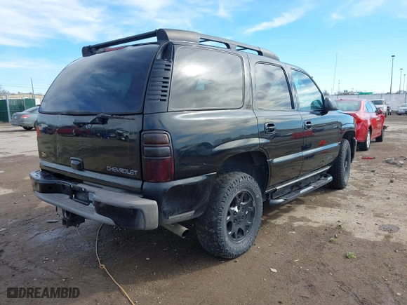 2001 Chevrolet Tahoe LS with VIN 1GNEK13T41R219642, listed as a IAAI auction lot 41655081 with 243,737 mi miles. Bid and sale history available at carsss.com. Image 4.