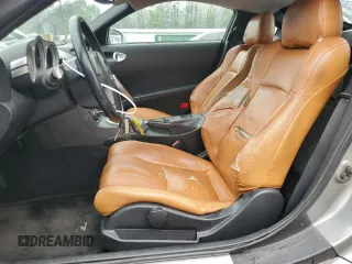 2003 Nissan 350Z Performance z VIN JN1AZ34D33T106988, wystawiony jako Copart lot #57933985 z przebiegiem 203 959 mil mil oraz Szkoda całkowita • Salvage title. Historia ofert i sprzedaży dostępna na DreamBid. Obrazek 7.