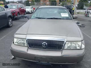 2004 Mercury Grand Marquis LS Premium with VIN 2MEFM75W44X604564, listed as a IAAI auction lot 41740462 with 119,693 mi miles. Bid and sale history available at carsss.com. Image 13.