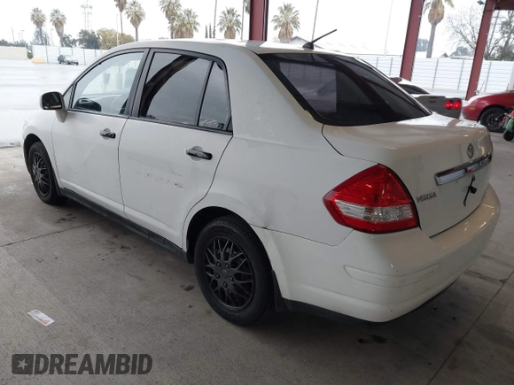 2010 Nissan Versa 1.8 S with VIN 3N1BC1AP7AL414885, listed as a IAAI auction lot 41484047 with 200,905 mi miles. Bid and sale history available at carsss.com. Image 3.