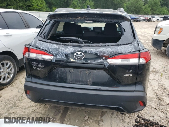 2022 Toyota Corolla Cross LE with VIN 7MUCAABG3NV021235, listed as a Copart auction lot 60644285 with 82,403 mi miles and Clean title. Bid and sale history available at DreamBid. Image 6.