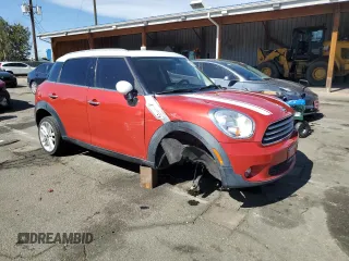 2014 MINI Countryman with VIN WMWZB3C56EWR41819, listed as a Copart auction lot 48149985 with 93,784 mi miles and Salvage Title. Bid and sale history available at DreamBid. Image 4.