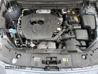 2024 Mazda CX-5 S Carbon Edition z VIN JM3KFBCM6R0367121, wystawiony jako Copart lot #51570125 z przebiegiem 49 762 mil mil oraz Szkody całkowita. Historia ofert i sprzedaży dostępna na DreamBid. Obrazek 13.
