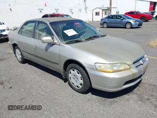 1999 Honda Accord LX with VIN JHMCG5642XC012089, listed as a IAAI auction lot 42663859 with 57,713 mi miles and . Bid and sale history available at DreamBid. Image 1.