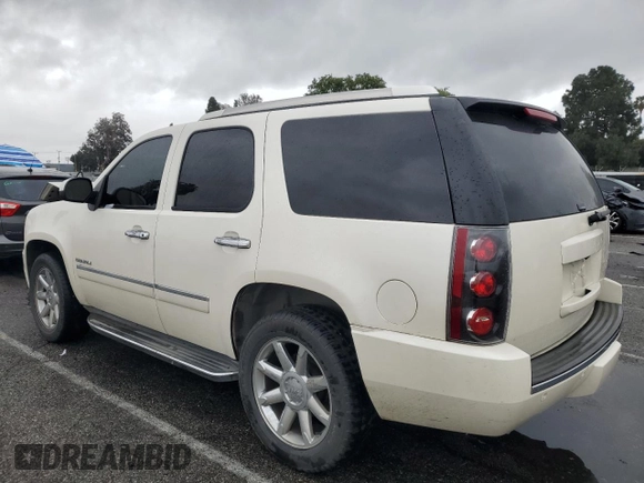 2011 GMC Yukon Denali with VIN 1GKS1EEF2BR337370, listed as a Copart auction lot 49311105 with 131,840 mi miles and Salvage Title. Bid and sale history available at carsss.com. Image 2.