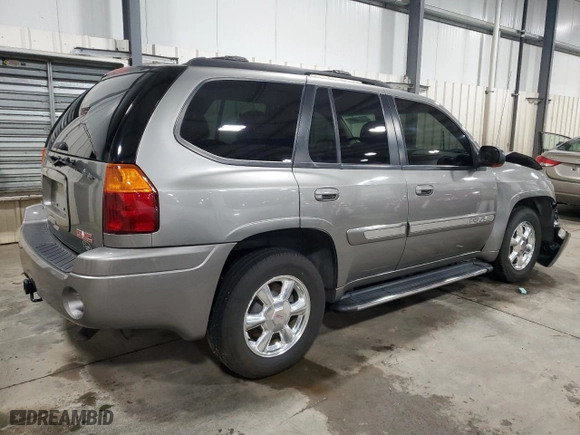 2005 GMC Envoy SLE with VIN 1GKDS13S252229262, listed as a Copart auction lot 51214685 with 117,256 mi miles and Salvage Title. Bid and sale history available at carsss.com. Image 3.