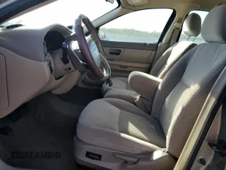 2004 Ford Taurus SE z VIN 1FAFP53284A156633, wystawiony jako Copart lot #58164985 z przebiegiem 91 246 mil mil oraz Szkoda całkowita • Salvage title. Historia ofert i sprzedaży dostępna na DreamBid. Obrazek 7.