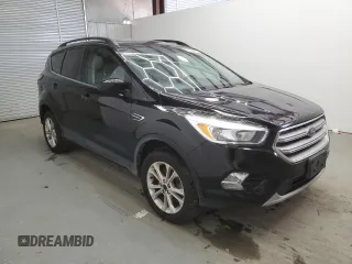 2018 Ford Escape SE z VIN 1FMCU9GD9JUD21474, wystawiony jako Copart lot #53921535 z przebiegiem 136 819 mil mil oraz Czysty tytuł • Clean title. Historia ofert i sprzedaży dostępna na DreamBid. Obrazek 4.