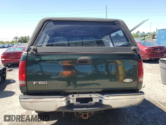 2002 Ford F-150 XL with VIN 1FTRF17212NB27204, listed as a Copart auction lot 50249885 with 0 mi miles and Salvage Title. Bid and sale history available at carsss.com. Image 6.