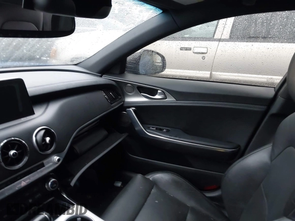 2018 Kia Stinger GT1 with VIN KNAE45LCXJ6018532, listed as a IAAI auction lot 41563629 with 91,043 mi miles. Bid and sale history available at carsss.com. Image 5.