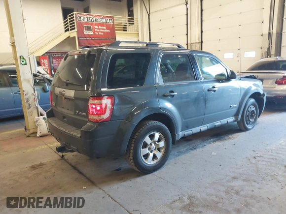 2010 Ford Escape Hybrid with VIN 1FMCU4K39AKC83189, listed as a IAAI auction lot 41544476 with 219,041 mi miles and . Bid and sale history available at DreamBid. Image 4.
