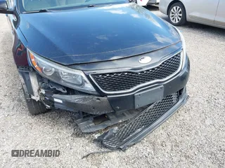 2014 Kia Optima EX z VIN 5XXGN4A71EG340220, wystawiony jako IAAI lot #42176989 z przebiegiem 177 064 mil mil oraz . Historia ofert i sprzedaży dostępna na DreamBid. Obrazek 6.