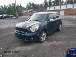 2013 MINI Countryman S z VIN WMWZC3C57DWP22864, wystawiony jako IAAI lot #42041909 z przebiegiem 139 932 mil mil oraz . Historia ofert i sprzedaży dostępna na DreamBid. Obrazek 2.