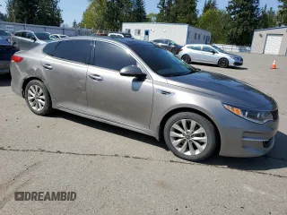 2016 Kia Optima EX with VIN 5XXGU4L30GG104013, listed as a Copart auction lot 54220105 with 120,073 mi miles and Salvage Title. Bid and sale history available at carsss.com. Image 4.