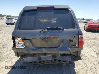 2001 Toyota Land Cruiser z VIN JTEHT05JX12015523, wystawiony jako Copart lot #57561425 z przebiegiem 277 413 mil mil oraz Szkoda całkowita • Salvage title. Historia ofert i sprzedaży dostępna na DreamBid. Obrazek 6.