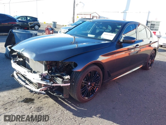2018 BMW 5 Series 540i with VIN WBAJE5C58JG918692, listed as a IAAI auction lot 41665415 with 61,261 mi miles and . Bid and sale history available at carsss.com. Image 18.