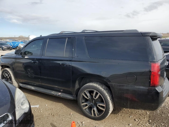 2019 Chevrolet Suburban LT with VIN 1GNSKHKC5KR291660, listed as a Copart auction lot 51587645 with 107,786 mi miles and Salvage Title. Bid and sale history available at carsss.com. Image 2.